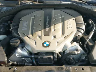 2011 BMW 7 Series 750Li xDrive with VIN WBAKC8C55BC434418, listed as a IAAI auction lot 42695385 with 93,427 mi miles and . Bid and sale history available at DreamBid. Image 12.