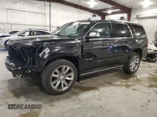 2015 Chevrolet Tahoe LTZ z VIN 1GNSKCKC1FR161108, wystawiony jako Copart lot #63514565 z przebiegiem 150 005 mil mil oraz Szkoda całkowita • Salvage title. Historia ofert i sprzedaży dostępna na DreamBid. Obrazek 1.