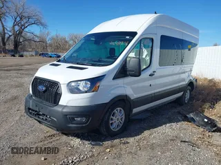 2024 Ford Transit Passenger XL with VIN 1FBAX2X85RKA46890, listed as a IAAI auction lot 41648977 with 20,637 mi miles and . Bid and sale history available at DreamBid. Image 2.
