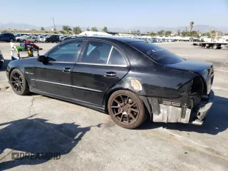 2004 Mercedes-Benz E 55 AMG with VIN WDBUF76J54A560975, listed as a Copart auction lot 68046383 with 155,132 mi miles and Salvage Title. Bid and sale history available at DreamBid. Image 2.