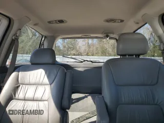 2004 Honda Odyssey EX-L with VIN 5FNRL18974B074613, listed as a Copart auction lot 48924865 with 212,633 mi miles and Salvage Title. Bid and sale history available at DreamBid. Image 10.