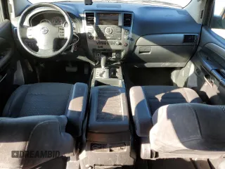 2012 Nissan Armada SV z VIN 5N1AA0NDXCN604199, wystawiony jako Copart lot #41769845 z przebiegiem 155 731 mil mil oraz Szkoda całkowita • Salvage title. Historia ofert i sprzedaży dostępna na DreamBid. Obrazek 8.