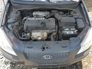 2009 Kia Rio LX with VIN KNADE223296539006, listed as a Copart auction lot 69229394 with 227,766 mi miles and Salvage Title. Bid and sale history available at DreamBid. Image 11.