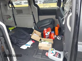 2010 Dodge Grand Caravan SXT with VIN 2D4RN5D13AR426980, listed as a IAAI auction lot 42035672 with 162,584 mi miles and . Bid and sale history available at DreamBid. Image 8.