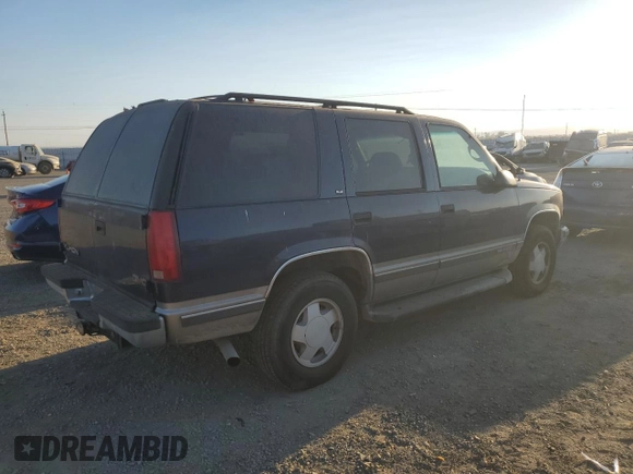 1999 GMC Yukon with VIN 1GKEK13RXXJ748733, listed as a Copart auction lot 74125914 with 172,766 mi miles and Clean Title. Bid and sale history available at carsss.com. Image 3.