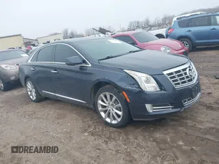 2013 Cadillac XTS Luxury with VIN 2G61P5S32D9196946, listed as a IAAI auction lot 41732441 with 110,380 mi miles. Bid and sale history available at carsss.com. Image 1.