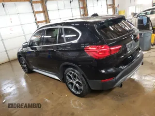 2017 BMW X1 xDrive28i with VIN WBXHT3C34H5F87048, listed as a Copart auction lot 67545012 with 76,666 mi miles. Bid and sale history available at carsss.com. Image 2.