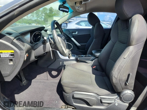 2010 Hyundai Genesis Coupe with VIN KMHHT6KD9AU028740, listed as a Copart auction lot 62997005 with 210,161 mi miles and Clean title. Bid and sale history available at DreamBid. Image 7.