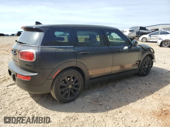 2016 MINI Clubman z VIN WMWLN5C50G2E29737, wystawiony jako Copart lot #50459135 z przebiegiem 129 940 mil mil oraz Szkody całkowita. Historia ofert i sprzedaży dostępna na DreamBid. Obrazek 3.