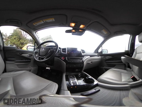 2017 Honda Pilot Touring with VIN 5FNYF6H92HB012090, listed as a IAAI auction lot 41882542 with 110,179 mi miles and . Bid and sale history available at DreamBid. Image 18.