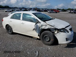 2010 Toyota Corolla with VIN 2T1BU4EE2AC236326, listed as a Copart auction lot 62461195 with 215,106 mi miles and Salvage title. Bid and sale history available at DreamBid. Image 4.