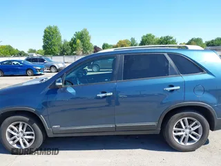 2015 Kia Sorento LX with VIN 5XYKTDA64FG554803, listed as a IAAI auction lot 42561844 with Not provided miles and . Bid and sale history available at DreamBid. Image 6.