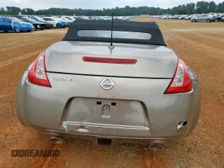 2010 Nissan 370Z z VIN JN1AZ4FH0AM301315, wystawiony jako Copart lot #86204894 z przebiegiem Nie podano mil oraz Szkoda całkowita • Salvage title. Historia ofert i sprzedaży dostępna na DreamBid. Obrazek 6.