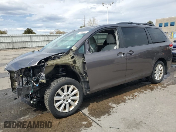 2012 Toyota Sienna LE with VIN 5TDJK3DC8CS047122, listed as a Copart auction lot 52036115 with 76,869 mi miles and Salvage Title. Bid and sale history available at carsss.com. Image 1.
