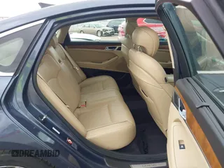 2015 Hyundai Genesis 3.8L with VIN KMHGN4JE4FU093636, listed as a IAAI auction lot 42021732 with 130,512 mi miles. Bid and sale history available at carsss.com. Image 8.