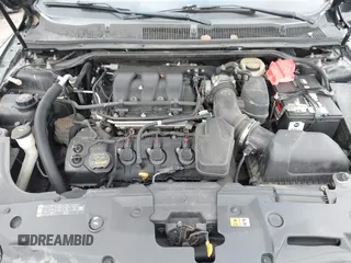 2013 Ford Taurus SEL with VIN 1FAHP2E87DG180296, listed as a IAAI auction lot 42016506 with 137,352 mi miles. Bid and sale history available at carsss.com. Image 10.