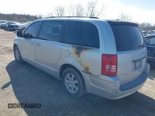 2010 Chrysler Town & Country Touring with VIN 2A4RR5D19AR450132, listed as a IAAI auction lot 41951121 with 283,451 mi miles. Bid and sale history available at carsss.com. Image 3.