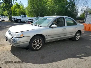 1998 Ford Contour LX z VIN 1FAFP66L2WK290948, wystawiony jako Copart lot #56204295 z przebiegiem 76 307 mil mil oraz Szkoda całkowita • Salvage title. Historia ofert i sprzedaży dostępna na DreamBid. Obrazek 1.