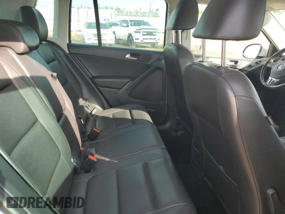 2014 Volkswagen Tiguan Trendline with VIN WVGJV3AX9EW540904, listed as a Copart auction lot 63908715 with Not provided miles and Salvage title. Bid and sale history available at DreamBid. Image 11.