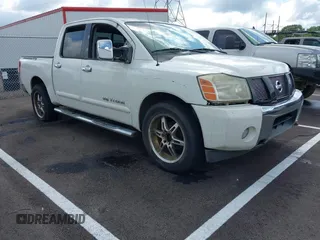 2007 Nissan Titan SE with VIN 1N6BA07A47N239680, listed as a IAAI auction lot 42587660 with 246,387 mi miles and . Bid and sale history available at DreamBid. Image 1.