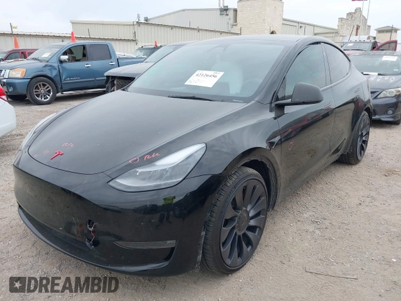 2024 Tesla Model Y Performance z VIN 7SAYGDEF7RA267752, wystawiony jako IAAI lot #42126456 z przebiegiem 21 216 mil mil oraz . Historia ofert i sprzedaży dostępna na DreamBid. Obrazek 2.