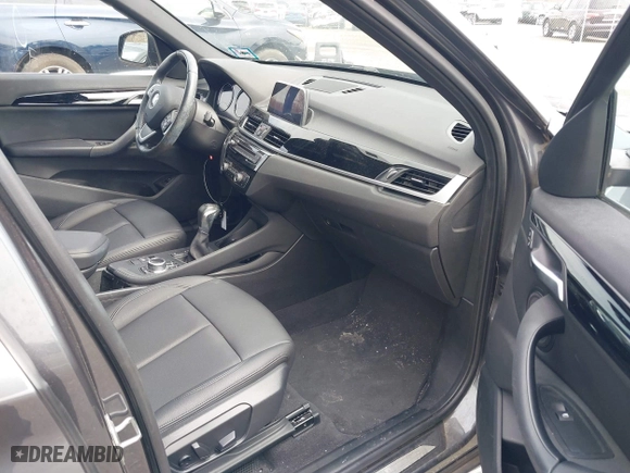 2019 BMW X1 xDrive28i with VIN WBXHT3C51K5L90571, listed as a IAAI auction lot 41909209 with 35,902 mi miles. Bid and sale history available at carsss.com. Image 5.