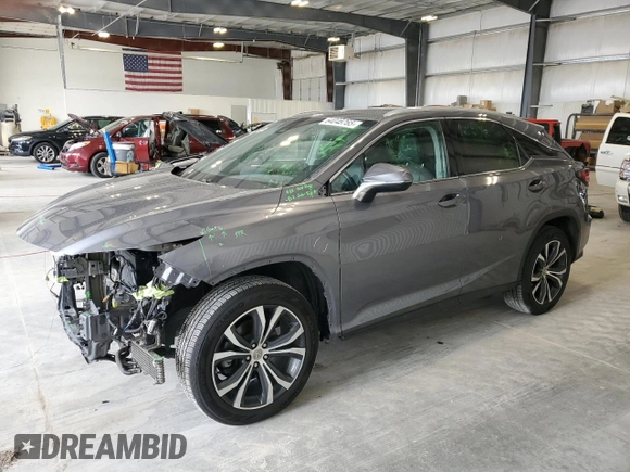 2016 Lexus RX 350 with VIN 2T2BZMCA1GC038794, listed as a Copart auction lot 64048765 with 114,205 mi miles and Salvage title. Bid and sale history available at DreamBid. Image 1.