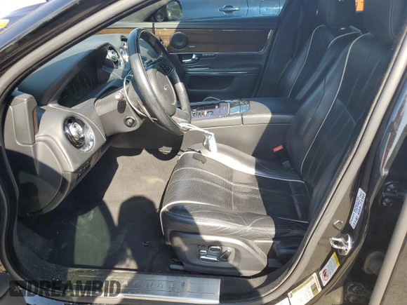 2013 Jaguar XJ Supercharged with VIN SAJWA2GE3DMV42875, listed as a Copart auction lot 71409324 with 129,422 mi miles and Salvage title. Bid and sale history available at DreamBid. Image 7.