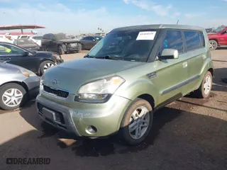 2010 Kia Soul + with VIN KNDJT2A24A7068057, listed as a IAAI auction lot 41464539 with 156,164 mi miles. Bid and sale history available at carsss.com. Image 2.