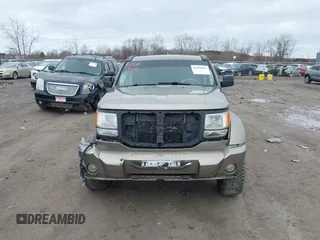 2007 Dodge Nitro SLT z VIN 1D8GU58K97W700047, wystawiony jako IAAI lot #41805822 z przebiegiem 186 604 mil mil oraz . Historia ofert i sprzedaży dostępna na DreamBid. Obrazek 11.