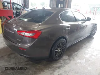 2015 Maserati Ghibli S Q4 z VIN ZAM57RTA3F1146241, wystawiony jako IAAI lot #42251953 z przebiegiem 133 411 mil mil oraz . Historia ofert i sprzedaży dostępna na DreamBid. Obrazek 4.