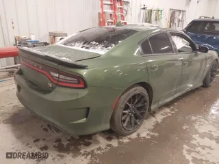 2020 Dodge Charger Scat Pack with VIN 2C3CDXGJ7LH120617, listed as a IAAI auction lot 41270023 with 118,924 mi miles. Bid and sale history available at carsss.com. Image 4.