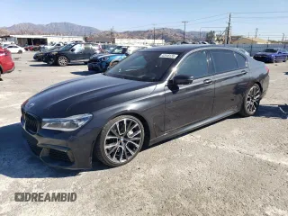 2019 BMW 7 Series 750i with VIN WBA7F0C56KGM25430, listed as a Copart auction lot 42048135 with 74,717 mi miles and Salvage Title. Bid and sale history available at carsss.com. Image 1.