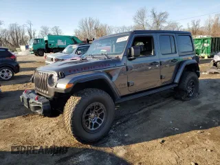 2021 Jeep Wrangler Unlimited Rubicon with VIN 1C4JJXFG8MW869995, listed as a Copart auction lot 83472254 with 48,302 mi miles and Salvage Title. Bid and sale history available at carsss.com. Image 1.