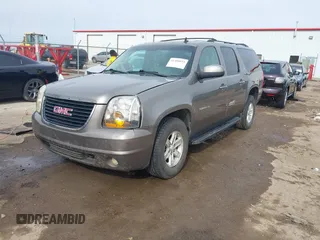 2012 GMC Yukon XL SLT with VIN 1GKS2KE78CR177257, listed as a IAAI auction lot 41488033 with 254,663 mi miles. Bid and sale history available at carsss.com. Image 2.