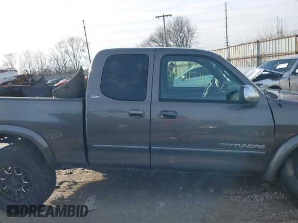 2003 Toyota Tundra SR5 with VIN 5TBBT44153S393708, listed as a IAAI auction lot 41591859 with 107,800 mi miles and . Bid and sale history available at DreamBid. Image 14.