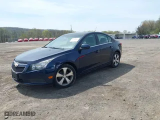 2011 Chevrolet Cruze LT w/2LT with VIN 1G1PG5S92B7235702, listed as a IAAI auction lot 42100947 with 85,759 mi miles. Bid and sale history available at carsss.com. Image 2.