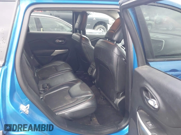 2018 Jeep Cherokee Trailhawk with VIN 1C4PJMBX3JD512813, listed as a IAAI auction lot 41457312 with 125,644 mi miles. Bid and sale history available at carsss.com. Image 8.