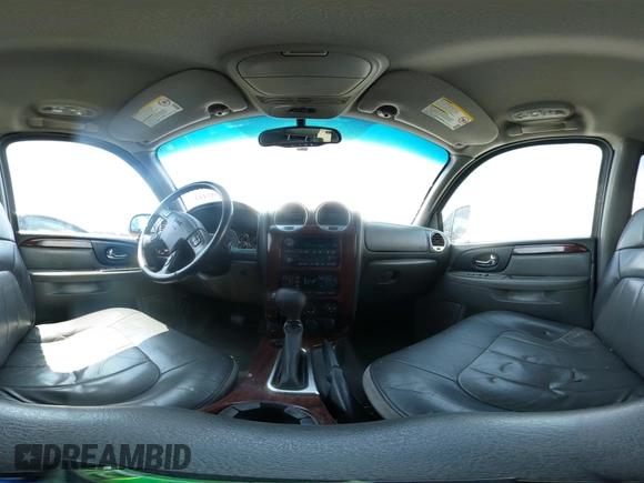 2004 GMC Envoy SLT with VIN 1GKDS13S742230325, listed as a IAAI auction lot 42385113 with 177,989 mi miles and . Bid and sale history available at DreamBid. Image 18.