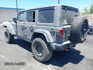 2023 Jeep Wrangler Rubicon with VIN 1C4JJXFG7PW541813, listed as a IAAI auction lot 42640045 with 53,645 mi miles and . Bid and sale history available at DreamBid. Image 13.
