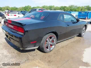 2014 Dodge Challenger SXT with VIN 2C3CDYAG7EH311556, listed as a IAAI auction lot 41868774 with 176,764 mi miles. Bid and sale history available at carsss.com. Image 4.