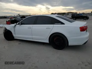 2015 Audi A6 3.0T Prestige with VIN WAUHGAFCXFN031884, listed as a Copart auction lot 41890843 with 136,077 mi miles. Bid and sale history available at carsss.com. Image 2.