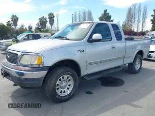 2001 Ford F-150 XL with VIN 1FTRX18L91KF29881, listed as a IAAI auction lot 42021554 with 199,041 mi miles. Bid and sale history available at carsss.com. Image 2.