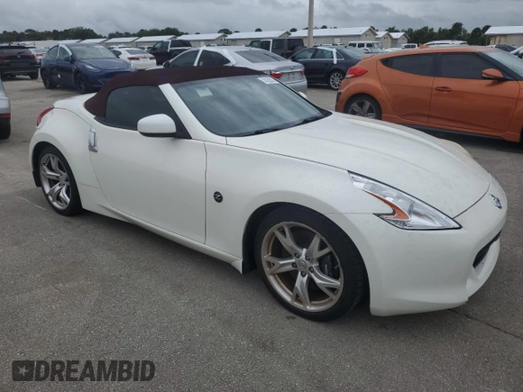 2012 Nissan 370Z Touring with VIN JN1AZ4FH1CM371246, listed as a Copart auction lot 74752074 with 60,688 mi miles and Salvage Title. Bid and sale history available at carsss.com. Image 4.