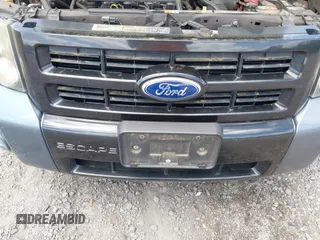 2011 Ford Escape XLT with VIN 1FMCU0D74BKA42232, listed as a IAAI auction lot 42144143 with 231,025 mi miles. Bid and sale history available at carsss.com. Image 6.