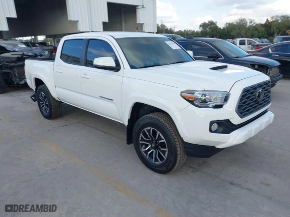 2023 Toyota Tacoma 4WD SR with VIN 3TMCZ5AN9PM566739, listed as a IAAI auction lot 41513763 with 16,708 mi miles. Bid and sale history available at carsss.com. Image 1.