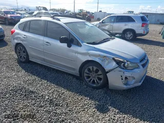 2013 Subaru Impreza Wagon 2.0i Sport Premium with VIN JF1GPAL62D2808219, listed as a IAAI auction lot 40585111 with 97,653 mi miles. Bid and sale history available at carsss.com. Image 1.