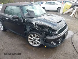 2013 MINI Convertible S with VIN WMWZP3C54DT297304, listed as a IAAI auction lot 41377572 with 101,991 mi miles and . Bid and sale history available at DreamBid. Image 6.