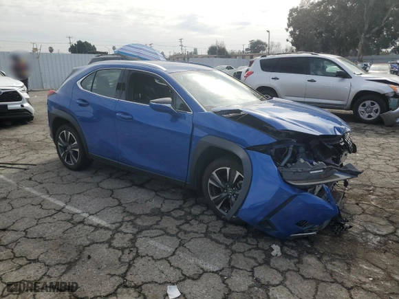 2022 Lexus UX with VIN JTHX3JBH0N2049742, listed as a Copart auction lot 43215465 with 18,728 mi miles and Salvage Title. Bid and sale history available at carsss.com. Image 4.