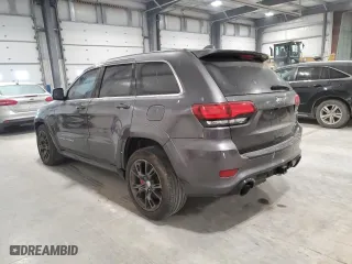 2015 Jeep Grand Cherokee SRT with VIN 1C4RJFDJ8FC752210, listed as a Copart auction lot 88773005 with 76,721 mi miles and Salvage Title. Bid and sale history available at carsss.com. Image 2.